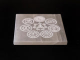 The Spiritual Living Natural Selenite Charging Plate with Seven Chakra Symbols (3 Inch Approx.)