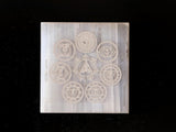 The Spiritual Living Natural Selenite Charging Plate with Seven Chakra Symbols (3 Inch Approx.)